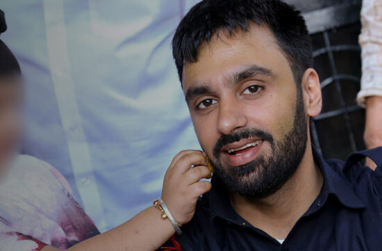Twitter image of Jagtar SIngh Johal with child with blurred out face