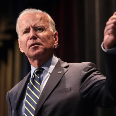 Image of US President Biden at a podium