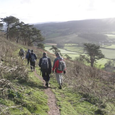 Hikers, on Bratton Ball by Roger Cornfoot